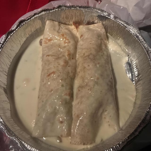 Two Grilled Steak Burritos.
